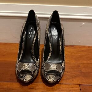 Aldo Black and Cream Snakeskin Heels
